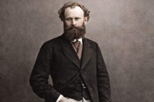 Édouard Manet: Porträt des französischen Malers mit markantem Bart, dunklem Anzug und gemusterter Krawatte